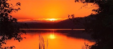 Charming Lakefront Home with Boat Dock & Stunning Sunsets
 on Lions Den Golf Club in Arkansas - for sale on GolfHomes.com, golf home, golf lot