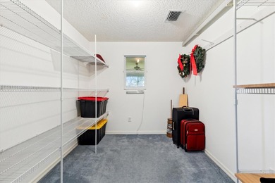 BOND PAID on this charming TURNKEY 3/2 HIBISCUS DESIGNER HOME on Oakleigh Executive Golf Course in Florida - for sale on GolfHomes.com, golf home, golf lot