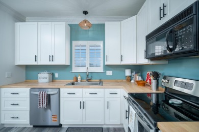 Stunning updated Gulf front unit ready for rental season or on Sandpiper Cove Golf Course in Florida - for sale on GolfHomes.com, golf home, golf lot