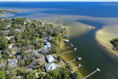 Welcome to your dream coastal retreat, nestled on the serene on Sandestin Golf and Beach Resort - Raven in Florida - for sale on GolfHomes.com, golf home, golf lot