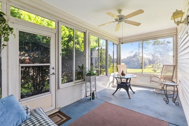 BOND PAID on this charming TURNKEY 3/2 HIBISCUS DESIGNER HOME on Oakleigh Executive Golf Course in Florida - for sale on GolfHomes.com, golf home, golf lot