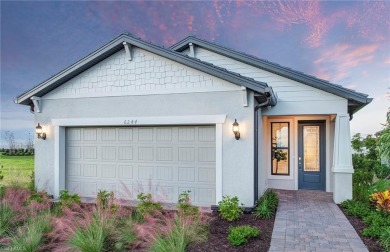 This stunning Hallmark Home Plan offers three spacious bedrooms on Valencia Golf and Country Club in Florida - for sale on GolfHomes.com, golf home, golf lot