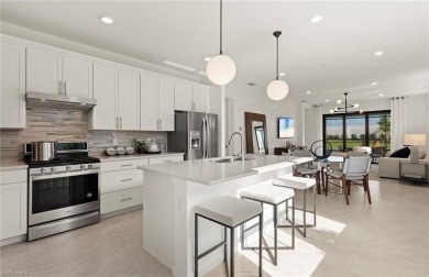 This stunning Hallmark Home Plan offers three spacious bedrooms on Valencia Golf and Country Club in Florida - for sale on GolfHomes.com, golf home, golf lot