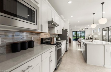 This stunning Hallmark Home Plan offers three spacious bedrooms on Valencia Golf and Country Club in Florida - for sale on GolfHomes.com, golf home, golf lot