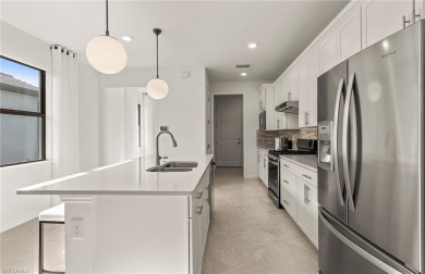 This stunning Hallmark Home Plan offers three spacious bedrooms on Valencia Golf and Country Club in Florida - for sale on GolfHomes.com, golf home, golf lot