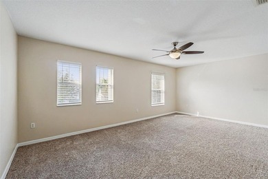 Located in the gated golf community of Eagle Creek, this move-in on Eagle Creek Golf Club in Florida - for sale on GolfHomes.com, golf home, golf lot