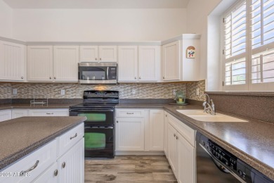 This gorgeous 2 bedroom, 2 bath home with a den is located in on Arizona Traditions Golf Club in Arizona - for sale on GolfHomes.com, golf home, golf lot