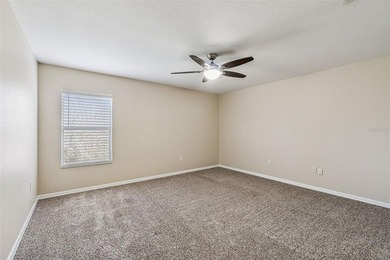 Located in the gated golf community of Eagle Creek, this move-in on Eagle Creek Golf Club in Florida - for sale on GolfHomes.com, golf home, golf lot