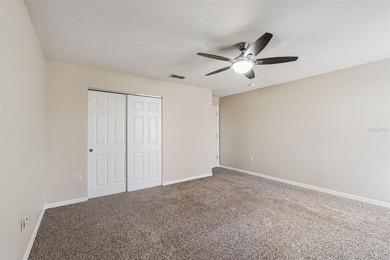 Located in the gated golf community of Eagle Creek, this move-in on Eagle Creek Golf Club in Florida - for sale on GolfHomes.com, golf home, golf lot