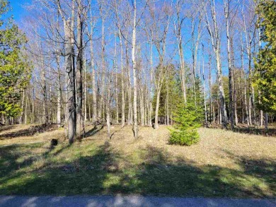 Excellent residential wooded building site located across from on Charlevoix Golf and Country Club in Michigan - for sale on GolfHomes.com, golf home, golf lot