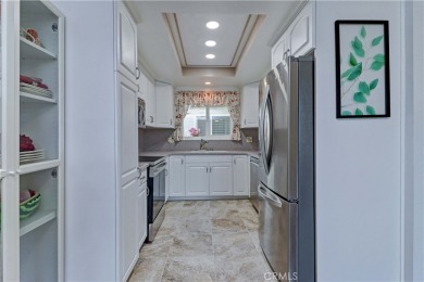 Charming Cordoba (2 bd/2ba/den) located in Laguna Woods Village on Laguna Woods Village Golf Course in California - for sale on GolfHomes.com, golf home, golf lot