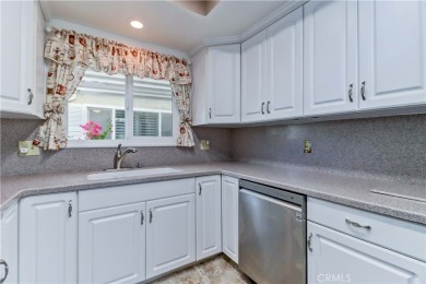 Charming Cordoba (2 bd/2ba/den) located in Laguna Woods Village on Laguna Woods Village Golf Course in California - for sale on GolfHomes.com, golf home, golf lot