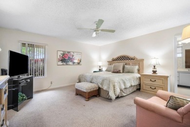 Discover the charm of this well-designed 3-bedroom, 2.5-bathroom on Fountains Golf and Country Club in Florida - for sale on GolfHomes.com, golf home, golf lot