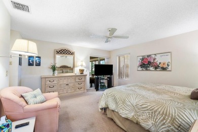 Discover the charm of this well-designed 3-bedroom, 2.5-bathroom on Fountains Golf and Country Club in Florida - for sale on GolfHomes.com, golf home, golf lot
