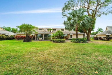 Discover the charm of this well-designed 3-bedroom, 2.5-bathroom on Fountains Golf and Country Club in Florida - for sale on GolfHomes.com, golf home, golf lot