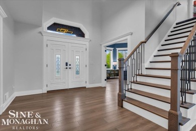 Not a single detail was spared in this sprawling custom brick on St Clair River Country Club in Michigan - for sale on GolfHomes.com, golf home, golf lot