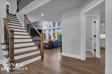 Not a single detail was spared in this sprawling custom brick on St Clair River Country Club in Michigan - for sale on GolfHomes.com, golf home, golf lot