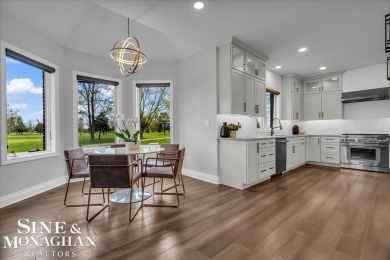 Not a single detail was spared in this sprawling custom brick on St Clair River Country Club in Michigan - for sale on GolfHomes.com, golf home, golf lot