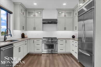 Not a single detail was spared in this sprawling custom brick on St Clair River Country Club in Michigan - for sale on GolfHomes.com, golf home, golf lot