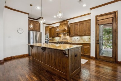 Stunning former model home perfectly positioned on the 13th hole on Lantana Golf Club in Texas - for sale on GolfHomes.com, golf home, golf lot
