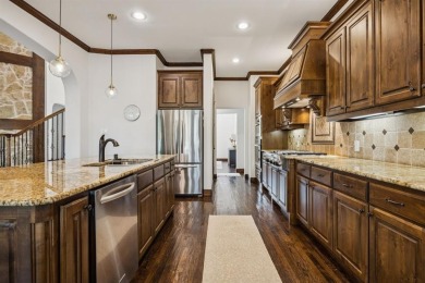 Stunning former model home perfectly positioned on the 13th hole on Lantana Golf Club in Texas - for sale on GolfHomes.com, golf home, golf lot