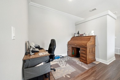 Welcome home to this beautifully maintained Breezeway Cottage on Water Oak Country Club Estates in Florida - for sale on GolfHomes.com, golf home, golf lot
