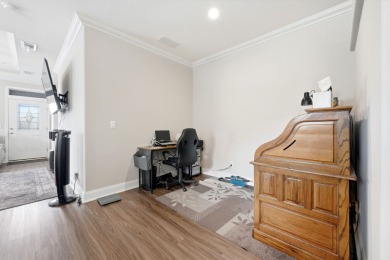 Welcome home to this beautifully maintained Breezeway Cottage on Water Oak Country Club Estates in Florida - for sale on GolfHomes.com, golf home, golf lot