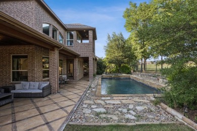 Stunning former model home perfectly positioned on the 13th hole on Lantana Golf Club in Texas - for sale on GolfHomes.com, golf home, golf lot