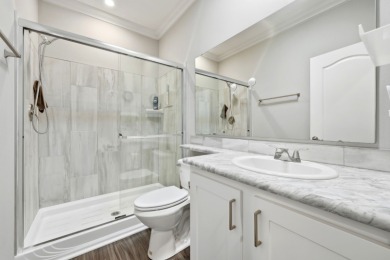 Welcome home to this beautifully maintained Breezeway Cottage on Water Oak Country Club Estates in Florida - for sale on GolfHomes.com, golf home, golf lot