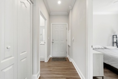 Welcome home to this beautifully maintained Breezeway Cottage on Water Oak Country Club Estates in Florida - for sale on GolfHomes.com, golf home, golf lot