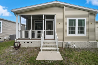 Welcome home to this beautifully maintained Breezeway Cottage on Water Oak Country Club Estates in Florida - for sale on GolfHomes.com, golf home, golf lot