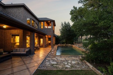 Stunning former model home perfectly positioned on the 13th hole on Lantana Golf Club in Texas - for sale on GolfHomes.com, golf home, golf lot
