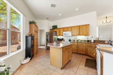 Located in a gated section of a golf course community, this well on Verde Santa Fe Golf Club in Arizona - for sale on GolfHomes.com, golf home, golf lot