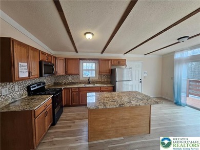 Great opportunity to own a fully updated raised chalet in the on Pocono Farms Country Club in Pennsylvania - for sale on GolfHomes.com, golf home, golf lot