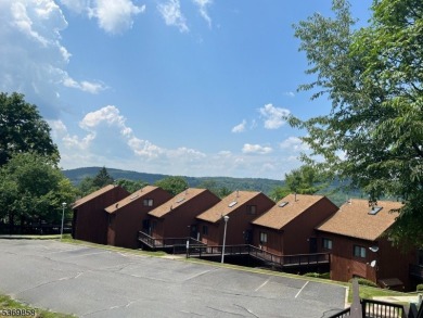 Discover this impressive end unit offers a generous 1,496 square on Minerals Golf Club in New Jersey - for sale on GolfHomes.com, golf home, golf lot