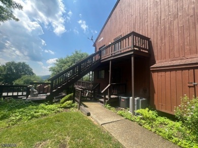 Discover this impressive end unit offers a generous 1,496 square on Minerals Golf Club in New Jersey - for sale on GolfHomes.com, golf home, golf lot
