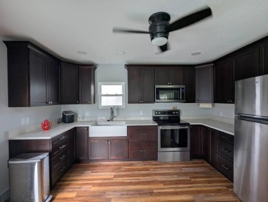 Perfect winter retreat for the RV'er wanting extra living space on The Great Outdoors Golf and Country Club in Florida - for sale on GolfHomes.com, golf home, golf lot