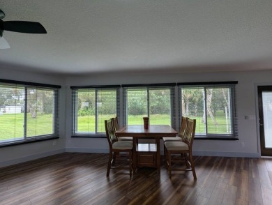 Perfect winter retreat for the RV'er wanting extra living space on The Great Outdoors Golf and Country Club in Florida - for sale on GolfHomes.com, golf home, golf lot