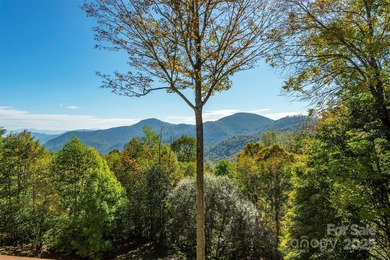 Offered FULLY FURNISHED, this stunning mountain retreat sits at on Wolf Laurel Country Club in North Carolina - for sale on GolfHomes.com, golf home, golf lot