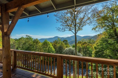 Offered FULLY FURNISHED, this stunning mountain retreat sits at on Wolf Laurel Country Club in North Carolina - for sale on GolfHomes.com, golf home, golf lot