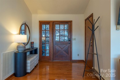Offered FULLY FURNISHED, this stunning mountain retreat sits at on Wolf Laurel Country Club in North Carolina - for sale on GolfHomes.com, golf home, golf lot