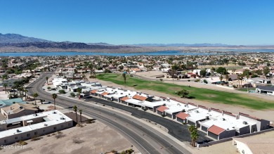 Beautiful Golf Course Condo with Lake Views! Discover golf on London Bridge Golf Course in Arizona - for sale on GolfHomes.com, golf home, golf lot