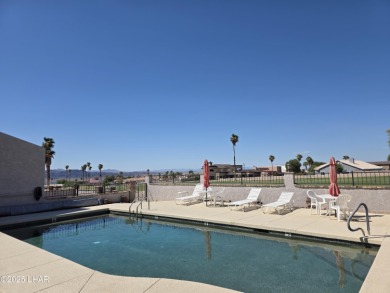 Beautiful Golf Course Condo with Lake Views! Discover golf on London Bridge Golf Course in Arizona - for sale on GolfHomes.com, golf home, golf lot