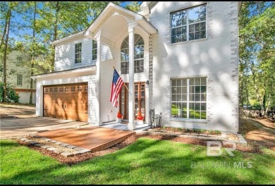 Welcome to this charming completely renovated home nestled in on Lake Forest Yacht and Country Club in Alabama - for sale on GolfHomes.com, golf home, golf lot