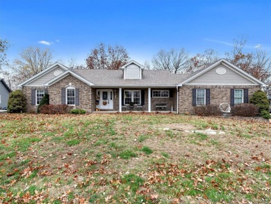 Feel as though you are on vacation living in this well kept on Country Club of Sugar Creek in Missouri - for sale on GolfHomes.com, golf home, golf lot