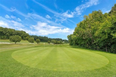 Feel as though you are on vacation living in this well kept on Country Club of Sugar Creek in Missouri - for sale on GolfHomes.com, golf home, golf lot