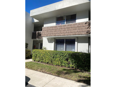 Fantastic ground floor corner garden apartment , with a on  in Florida - for sale on GolfHomes.com, golf home, golf lot