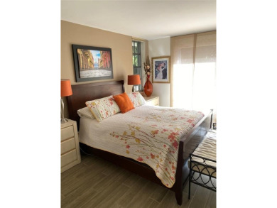 Fantastic corner garden apartment located on the ground floor on Oaks Country Club in Florida - for sale on GolfHomes.com, golf home, golf lot