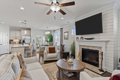 Immaculate 3-bedroom, home with bonus room on a desirable corner on Cape Fear National At Brunswick Forest in North Carolina - for sale on GolfHomes.com, golf home, golf lot