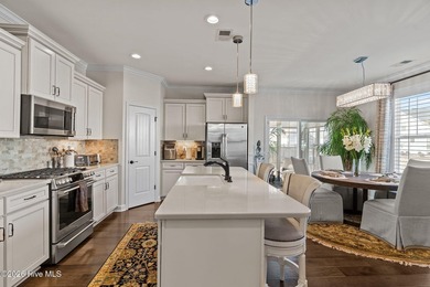 Immaculate 3-bedroom, home with bonus room on a desirable corner on Cape Fear National At Brunswick Forest in North Carolina - for sale on GolfHomes.com, golf home, golf lot